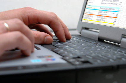 The man works on notebook